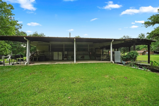 view of outdoor structure with a lawn