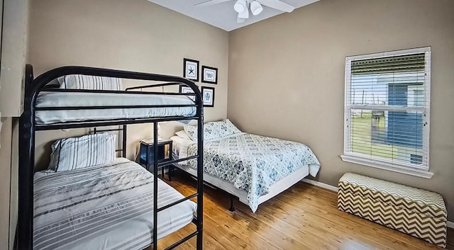 bedroom featuring hardwood / wood-style floors and ceiling fan