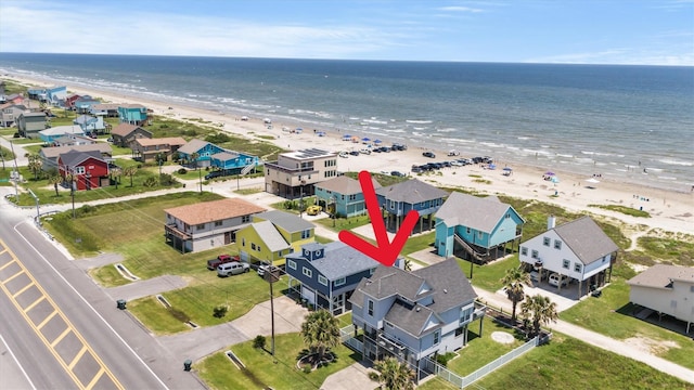 aerial view with a view of the beach and a water view