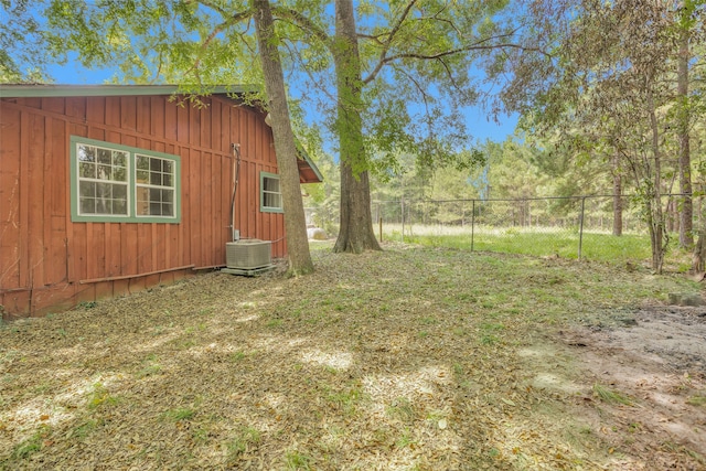 view of yard featuring central AC unit