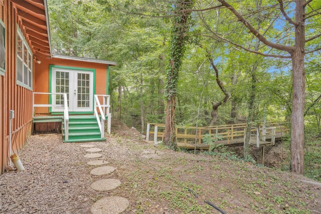 view of yard with french doors