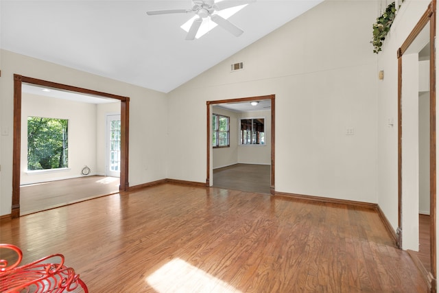 spare room featuring high vaulted ceiling, wood-type flooring, and ceiling fan