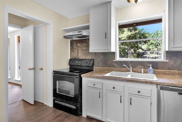 kitchen featuring dishwasher, extractor fan, sink, black range with electric stovetop, and white cabinets