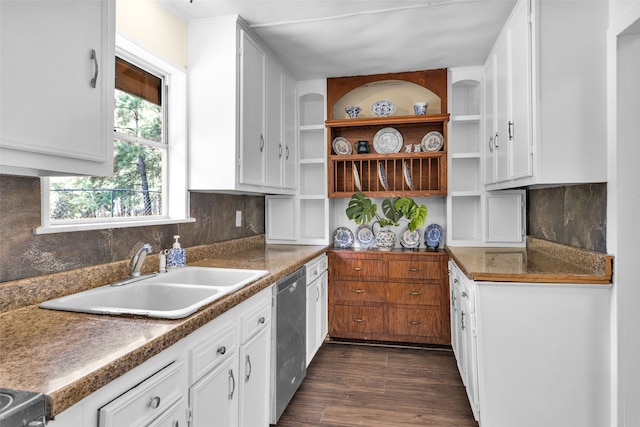 kitchen with white cabinets, tasteful backsplash, dark hardwood / wood-style flooring, stainless steel dishwasher, and sink