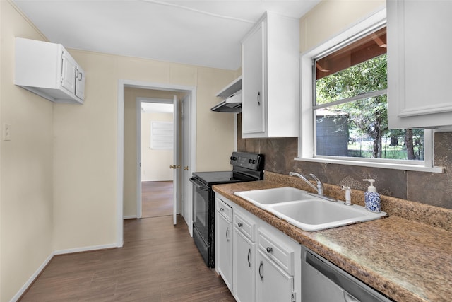 kitchen with tasteful backsplash, sink, electric range, white cabinetry, and dark wood-type flooring