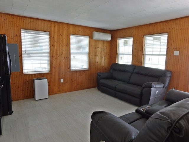 tiled living room featuring wood walls and a wall mounted AC