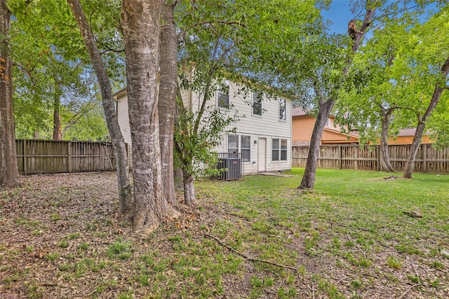 view of yard with central AC