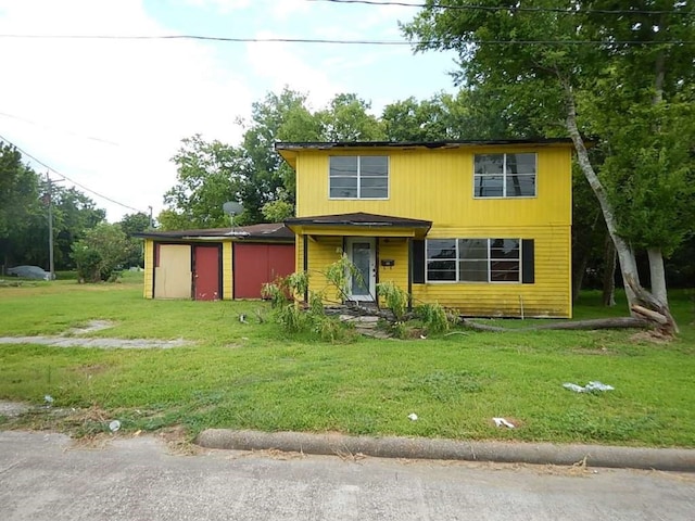 view of front of home with a front yard