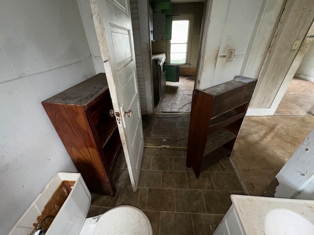 bathroom with vanity and toilet