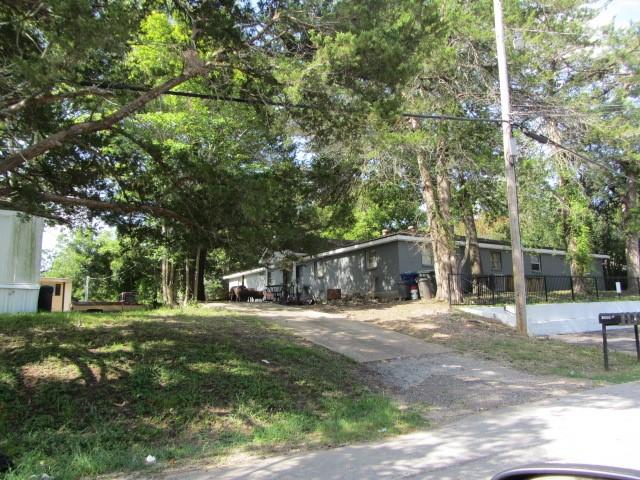 505 13 Th, Huntsville, TX 77340 - view of front of house with view of scattered trees