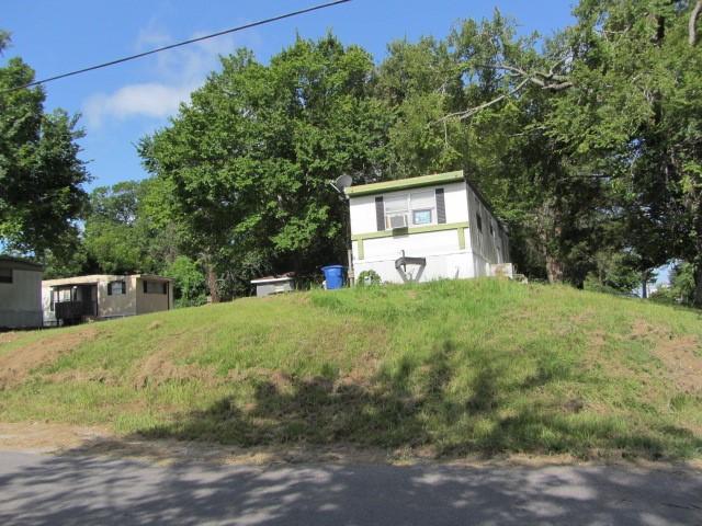 505 13 Th, Huntsville, TX 77340 - view of yard featuring a shed