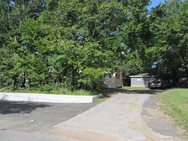 505 13 Th, Huntsville, TX 77340 - view of front of home featuring asphalt driveway