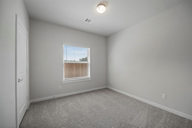 view of carpeted spare room