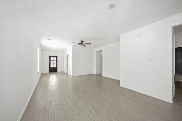 empty room featuring ceiling fan