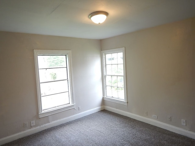 view of carpeted spare room