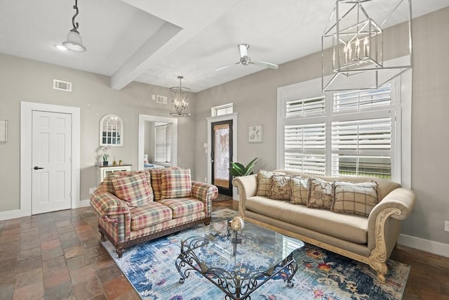 living room with ceiling fan and beam ceiling