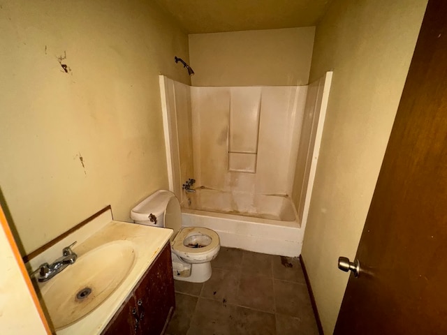 full bathroom featuring tub / shower combination, tile patterned floors, vanity, and toilet