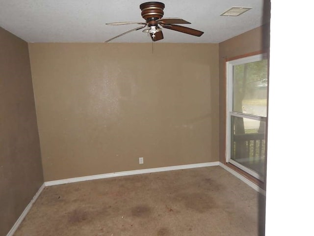 spare room featuring ceiling fan