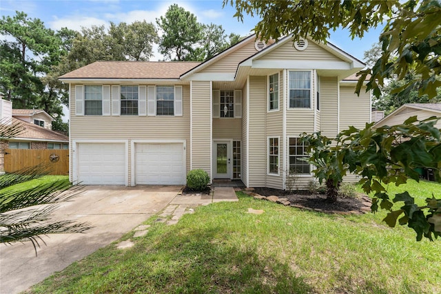 view of front of house featuring a garage and a front yard