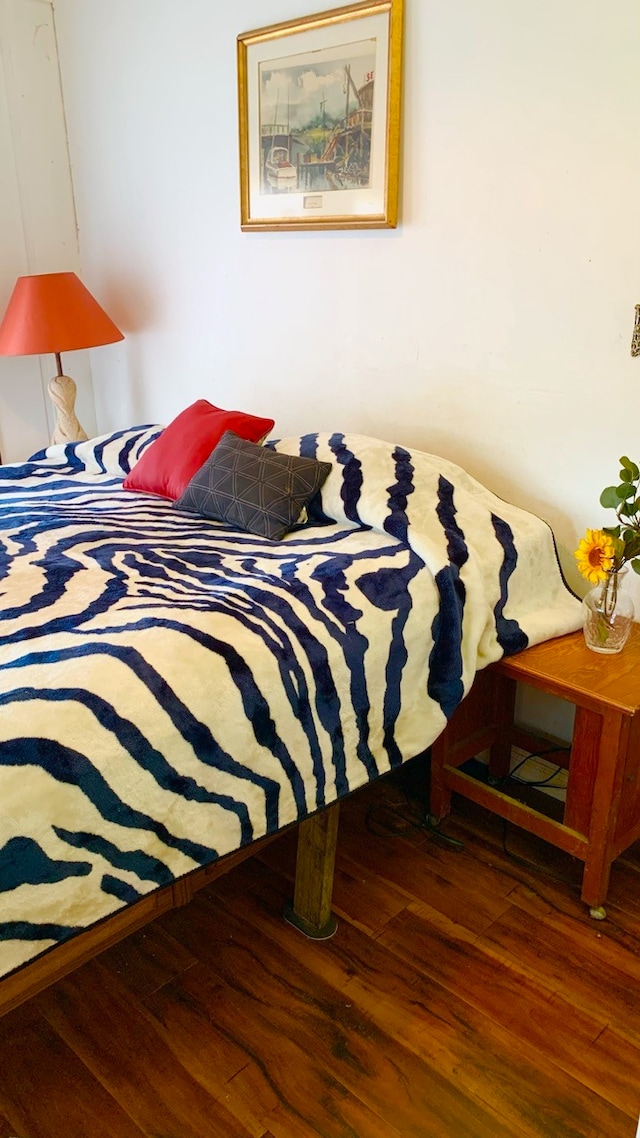 bedroom featuring hardwood / wood-style floors