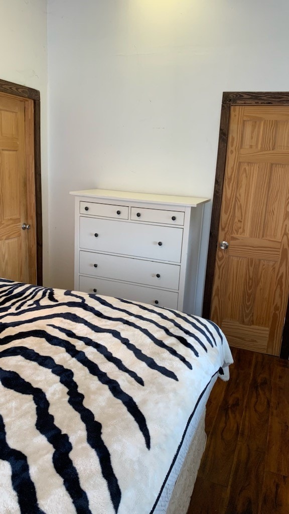 bedroom featuring hardwood / wood-style floors