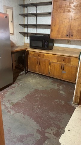 kitchen featuring stainless steel refrigerator