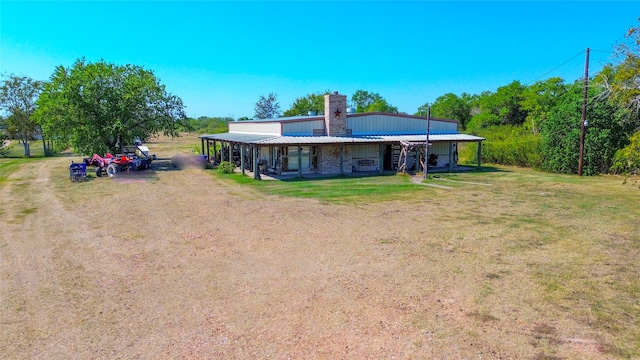 exterior space featuring a front lawn