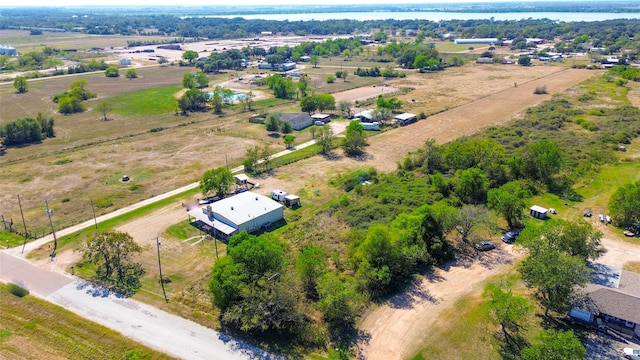 aerial view with a water view and a rural view