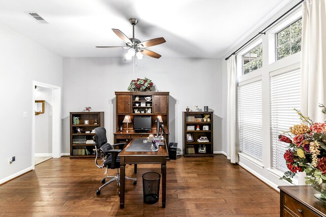 office area with ceiling fan and dark hardwood / wood-style floors