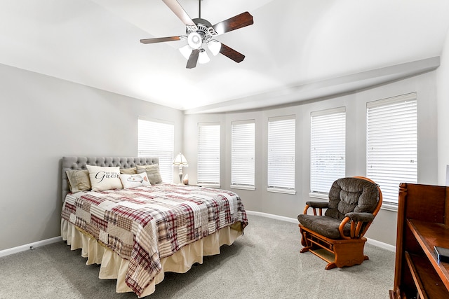 bedroom featuring multiple windows, carpet, and ceiling fan