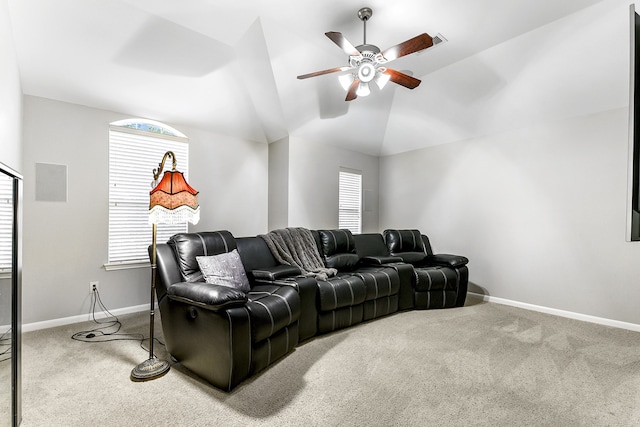 living room with carpet, a healthy amount of sunlight, and ceiling fan