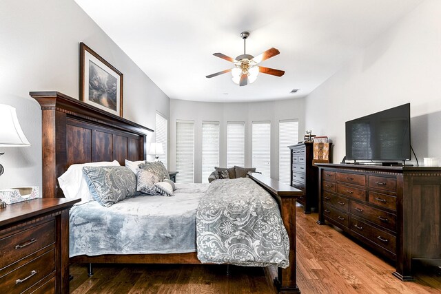 bedroom featuring hardwood / wood-style flooring and ceiling fan