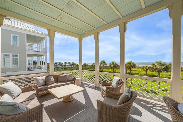 sunroom featuring wooden ceiling