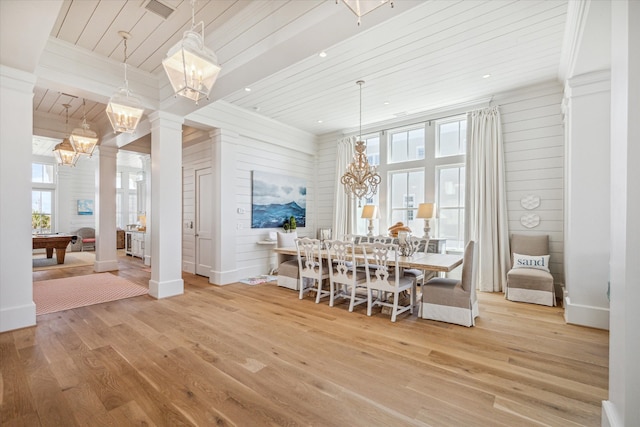 dining room featuring wood ceiling, decorative columns, light wood-type flooring, and pool table