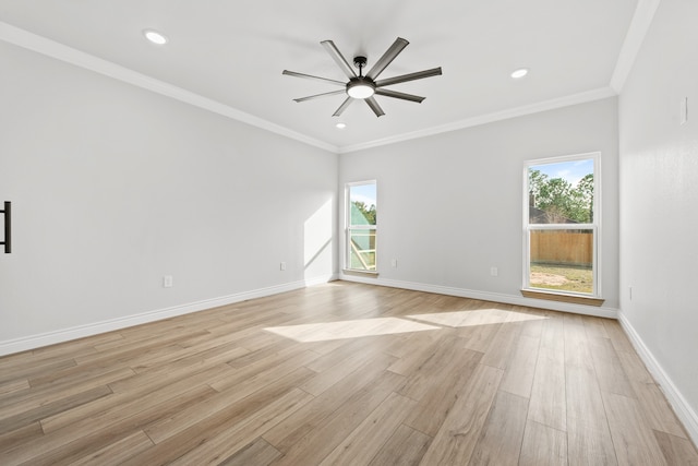 unfurnished room featuring ornamental molding, ceiling fan, and light hardwood / wood-style flooring