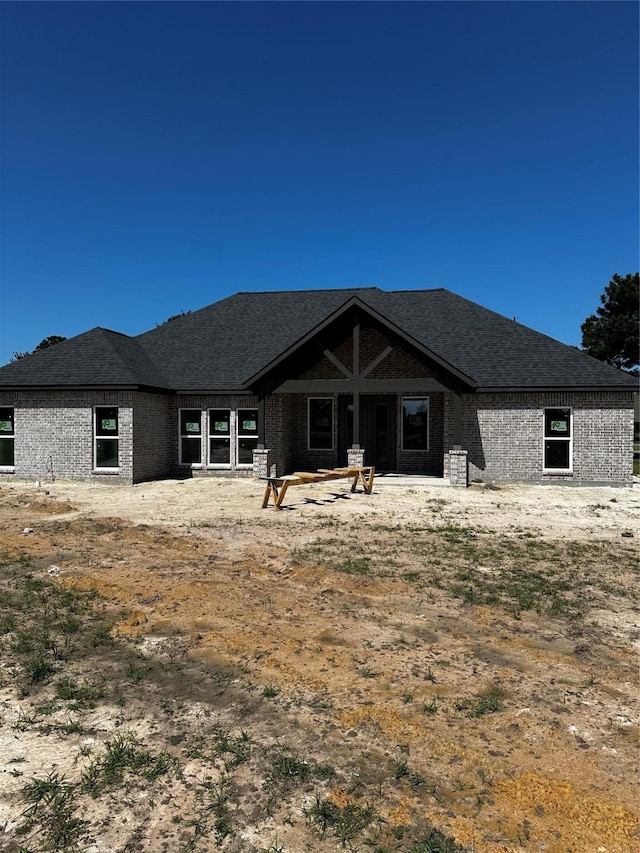 15408 Sandtrap Dr, Waller, TX 77484 - rear view of house featuring brick siding