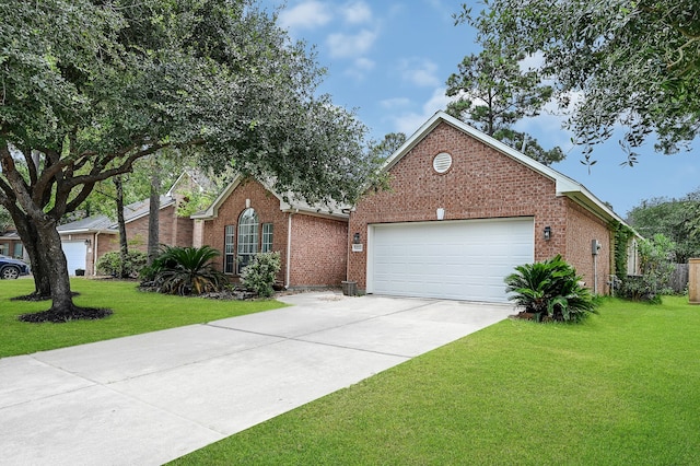 view of front facade featuring a garage and a front lawn