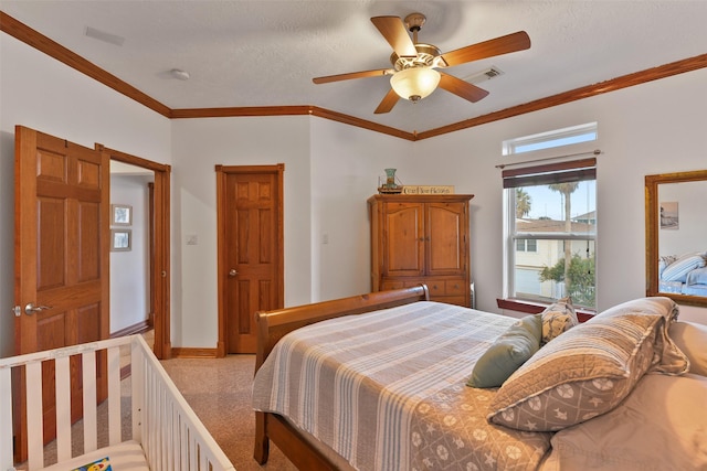 bedroom featuring crown molding, a textured ceiling, and ceiling fan