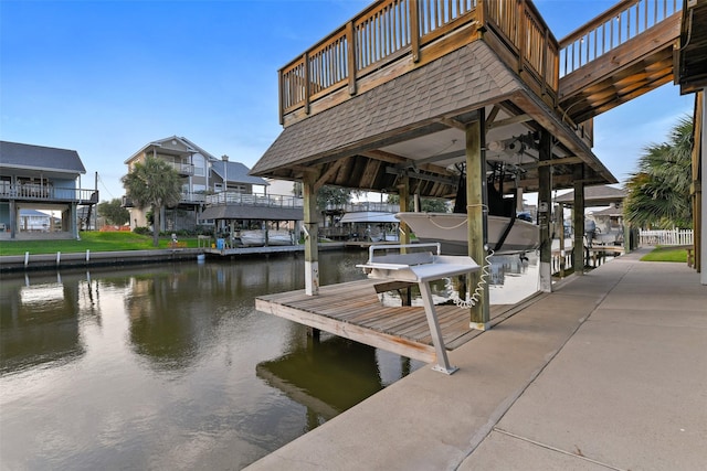 dock area with a water view