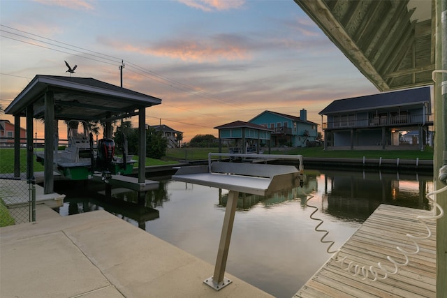 dock area with a water view