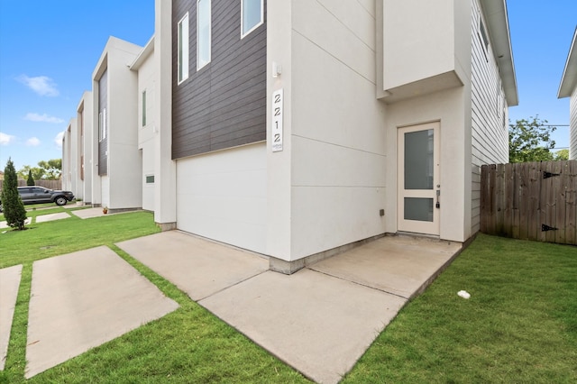 view of home's exterior with a yard