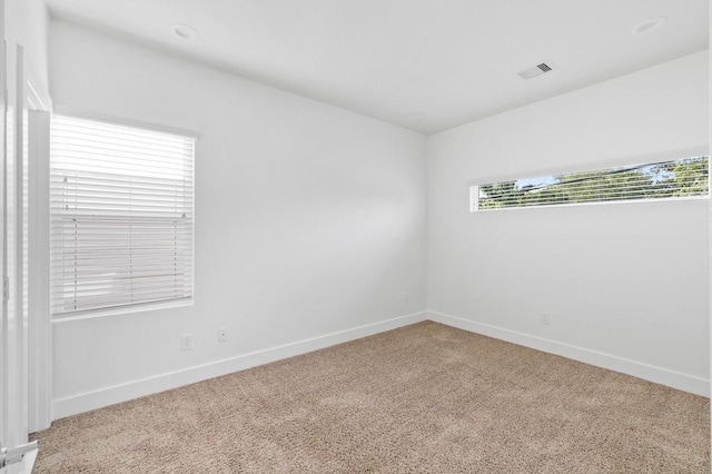 view of carpeted spare room