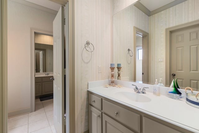 bathroom featuring tile patterned floors and vanity