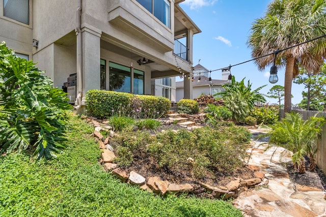 view of yard featuring a balcony