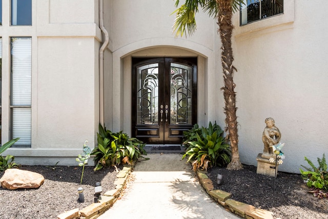 doorway to property with french doors