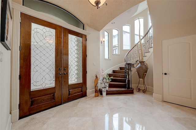 entryway featuring french doors