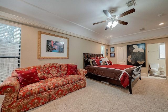 bedroom featuring light carpet, ornamental molding, and ceiling fan