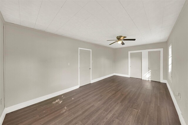 spare room with ceiling fan, wood-type flooring, and ornamental molding