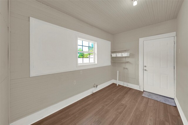 empty room with hardwood / wood-style floors