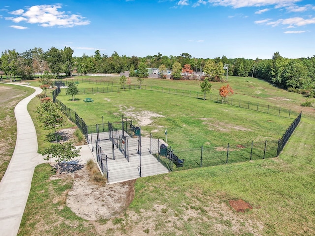 birds eye view of property with a rural view